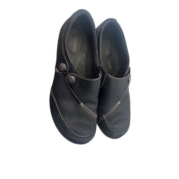 Clarks Black Slip-On Comfort Shoes with Contrast Stitching and Button Detail  Si - Picture 1 of 11